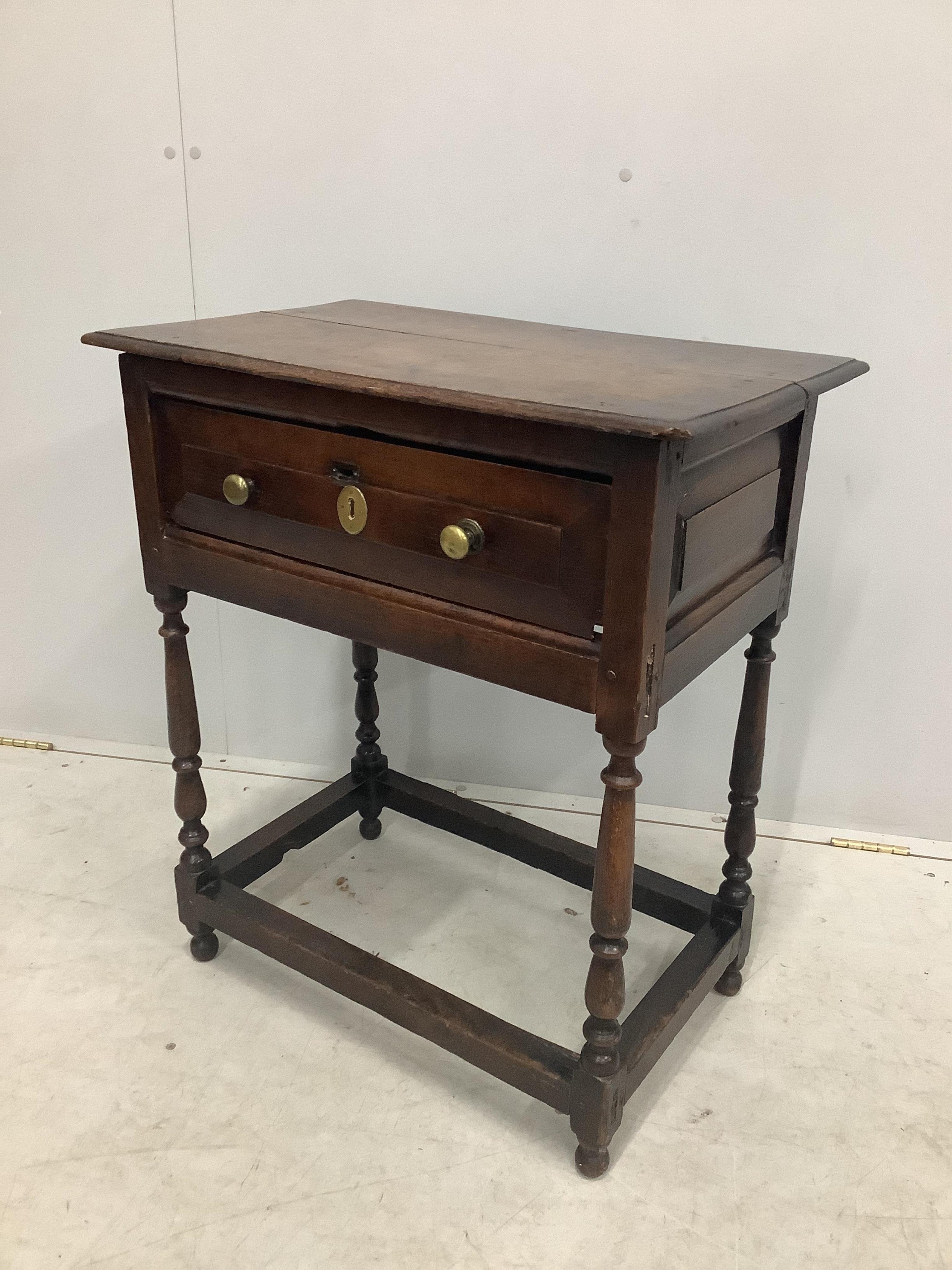 A small 18th century single drawer oak side table, width 65cm, depth 40cm, height 75cm. Condition - fair